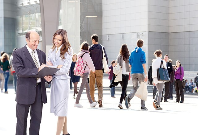 business people talking outside court house